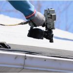 Metal roofer with staple gun